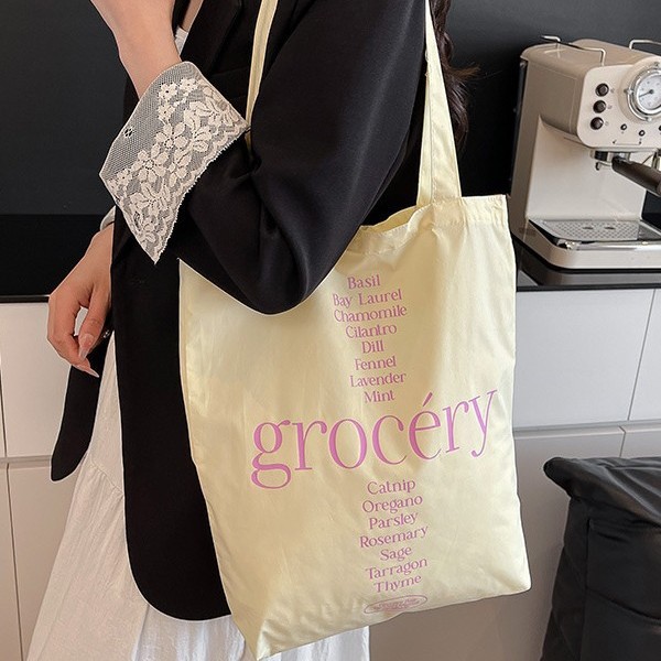 Korean sweet and simple canvas hand-held shoulder bag, student portable large-capacity lettered casual shopping canvas bag details Picture