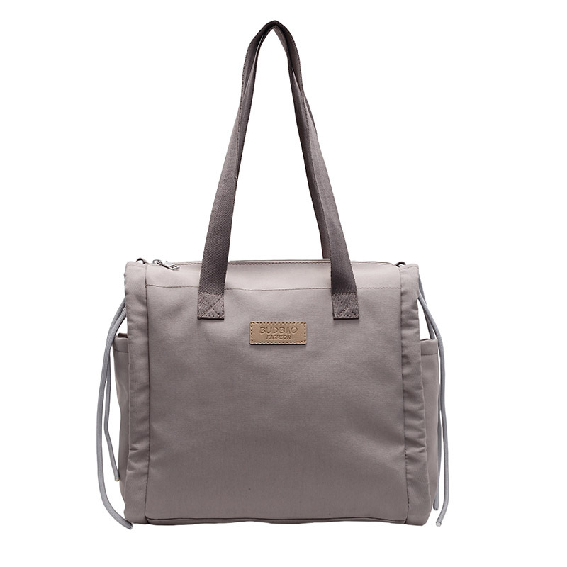 New women's bags, large-capacity canvas bags, student class eye-catching single-shoulder bags, commuting cloth bags, washbasin crossbody bags Item Picture