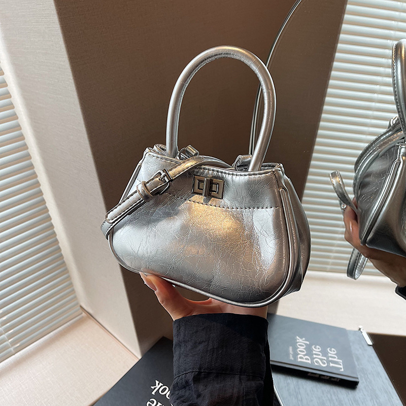 High-end hand-held bucket bag for women 2024 new style, fashionable, simple and versatile single-shoulder bag, niche design casual women's bag details Picture
