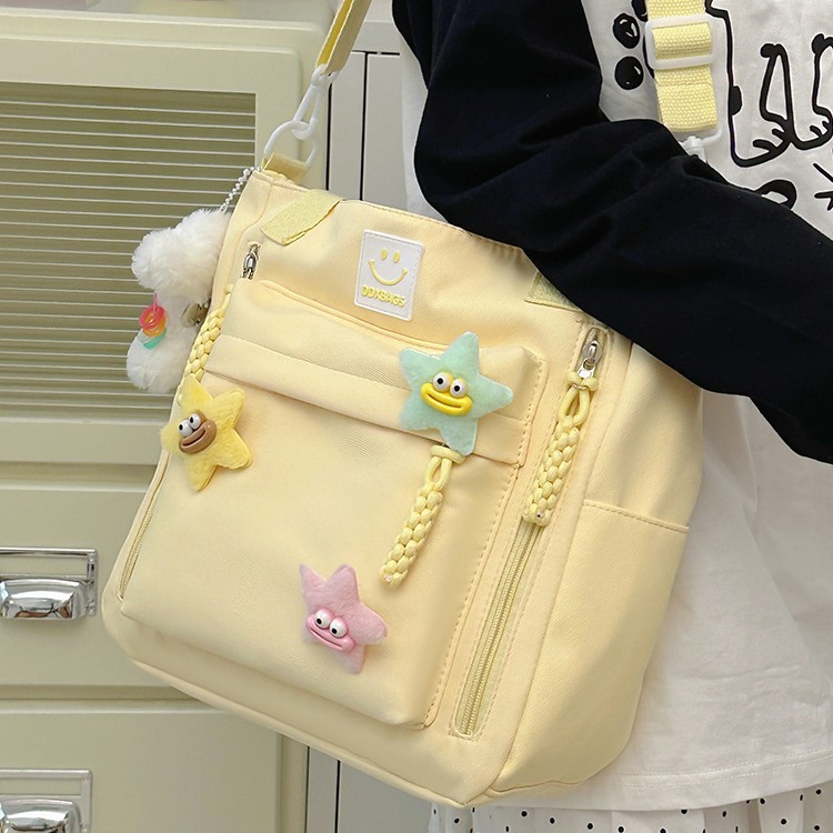 A versatile and casual fabric bag with a star-shaped design, lightweight and waterproof single-shoulder bag, and a crossbody bag for classes and shopping full figure