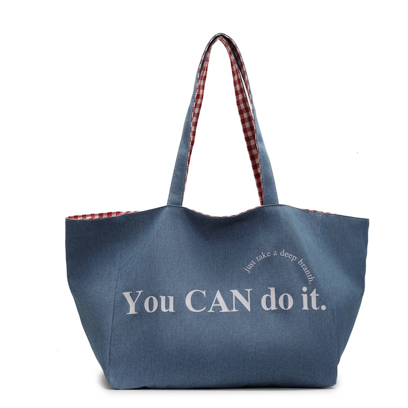 This canvas bag features a niche design with an ins high-end feel. It's a large-capacity commuter single-shoulder bag with Korean-style striped shopping bags on both sides Item Picture