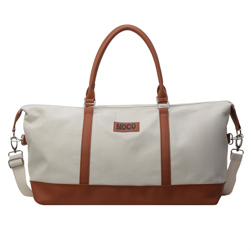 Wholesale of Korean-style hand-held travel bags, short-distance large-capacity luggage bags for men and women, fashionable and casual canvas yoga and fitness bags Item Picture