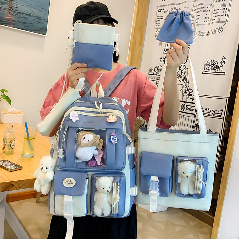 Korean style cute and versatile color-blocked canvas backpacks, 2022 new campus style color-blocking primary school students wholesale details Picture