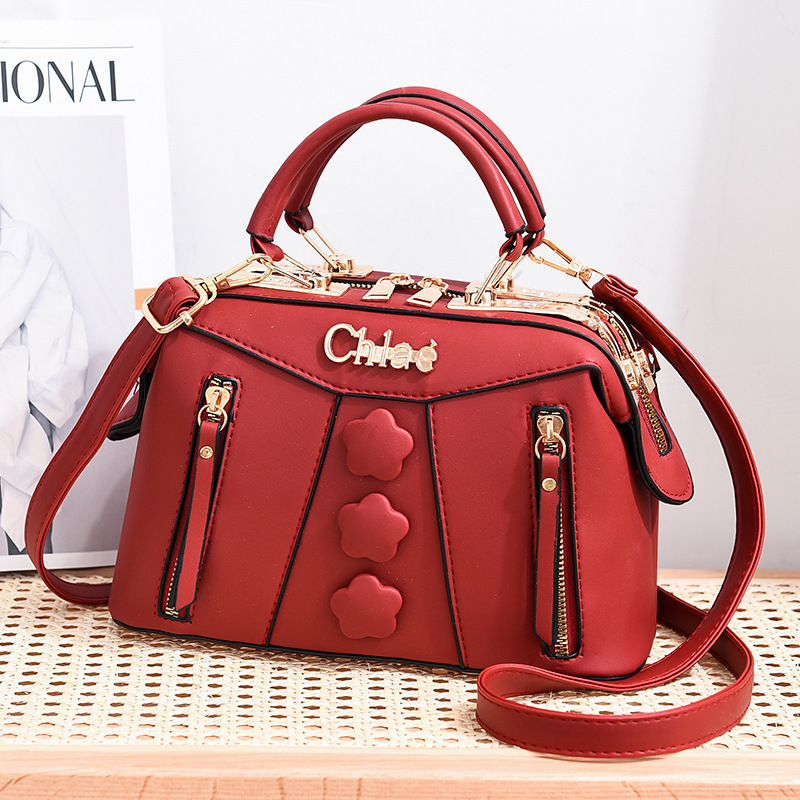 The 2022 new women's handbag is a trendy and fashionable large-capacity women's bag, a cross-border single-shoulder crossbody solid color button bag details Picture
