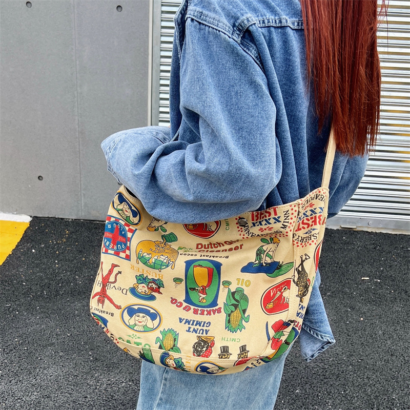 Artistic style casual crossbody bag, retro and personalized printed canvas bag for women, large-capacity tote bag for college students, women's bag details Picture