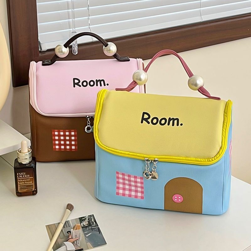 High appearance level dopamine House makeup bag for girls, large capacity partition hand-held waterproof bag, travel portable storage bag full figure