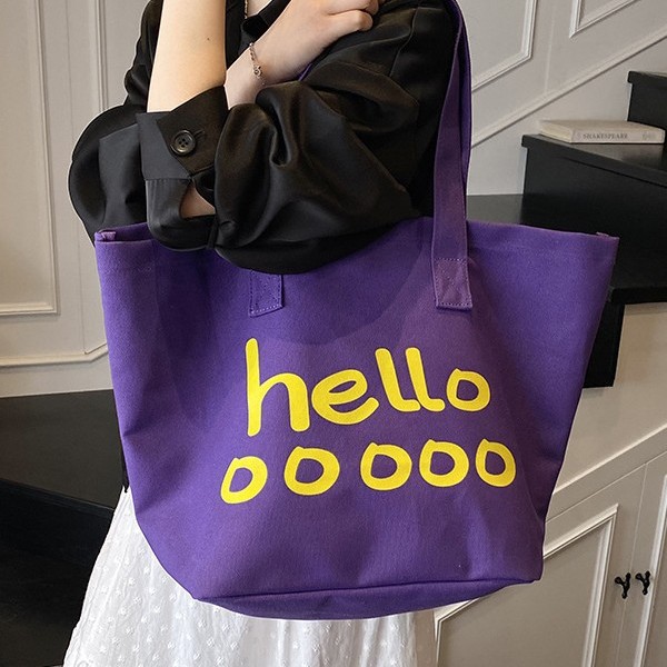 The new Korean version canvas bag, large-capacity single-shoulder lettered tote bag, simple and casual trendy bag, student shopping bag trend full figure