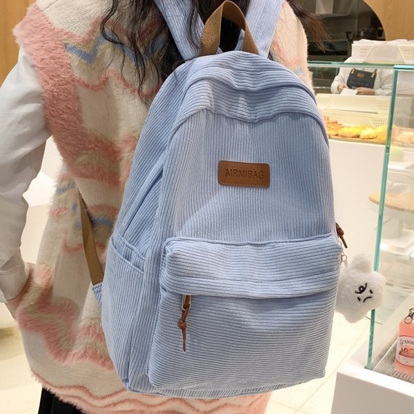 Corduroy lightweight and wear-resistant university backpack, fashionable and simple, large-capacity student schoolbag, solid color cute backpack Application Scenario