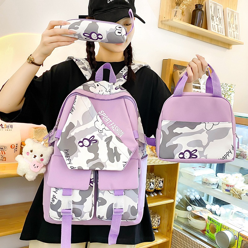 New fashionable cartoon backpack for women, Korean version, large-capacity student schoolbag set, three-piece nylon casual backpack full figure