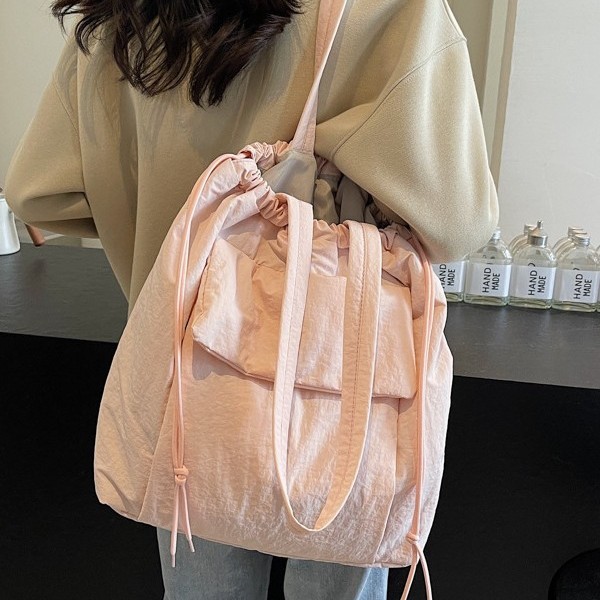 New spring and summer large-capacity tote bag for commuting, high appearance level, underarm single-shoulder bag, simple and versatile, fresh solid color bag full figure