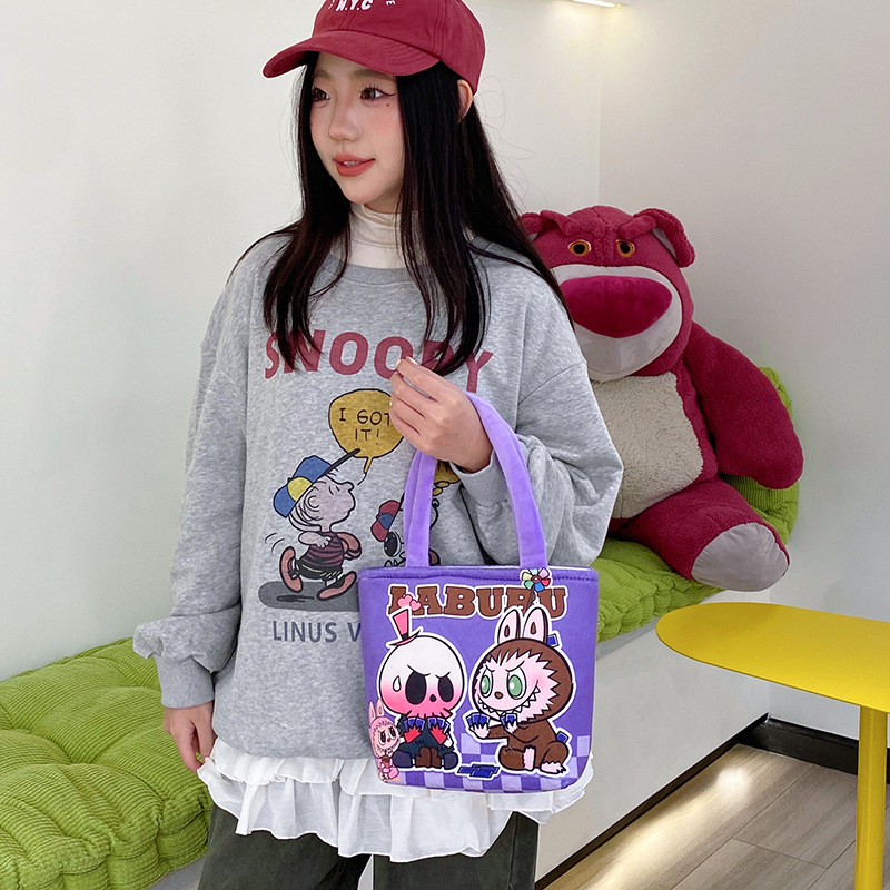 A new cartoon multi-pattern printed handbag with a Japanese girl's heart, a hand-held storage bag with a zipper Specification drawing