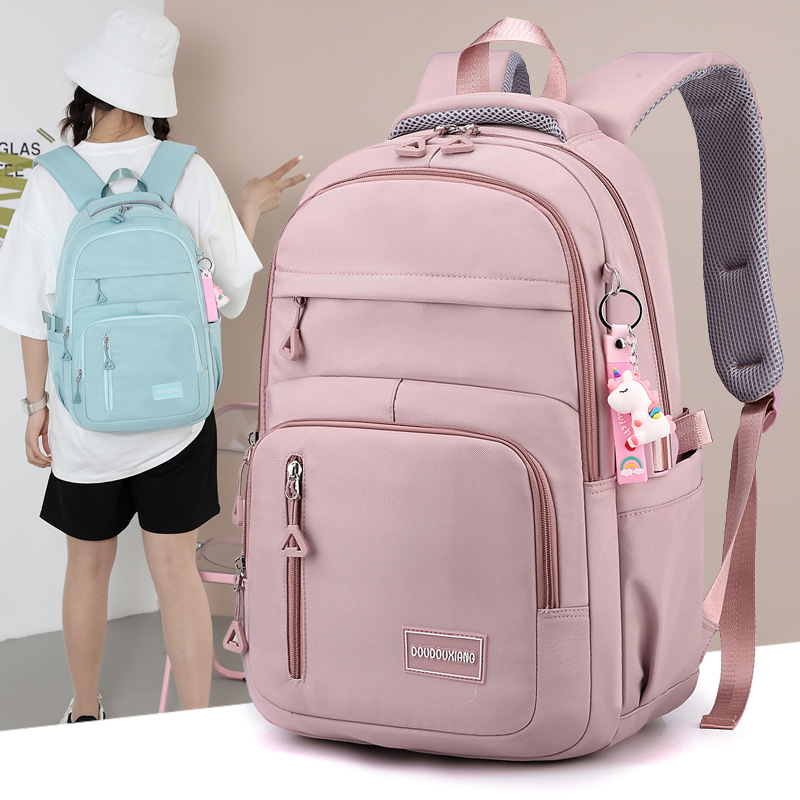 A new large-capacity schoolbag for junior and senior high school students, a high-end solid-color casual backpack for women, and a multi-layered travel bag trend full figure
