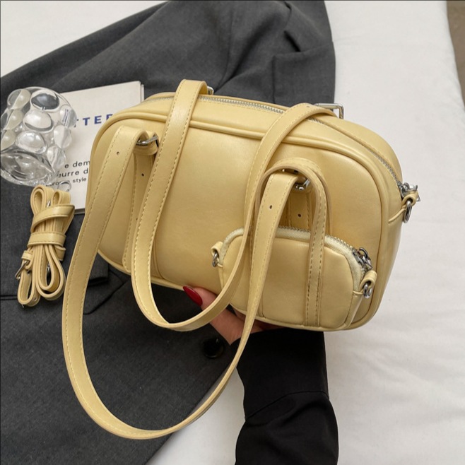 Cross-border niche design multi-pocket hand-held bowling bag for women 2025 new style fashionable single-shoulder crossbody pillow bag full figure