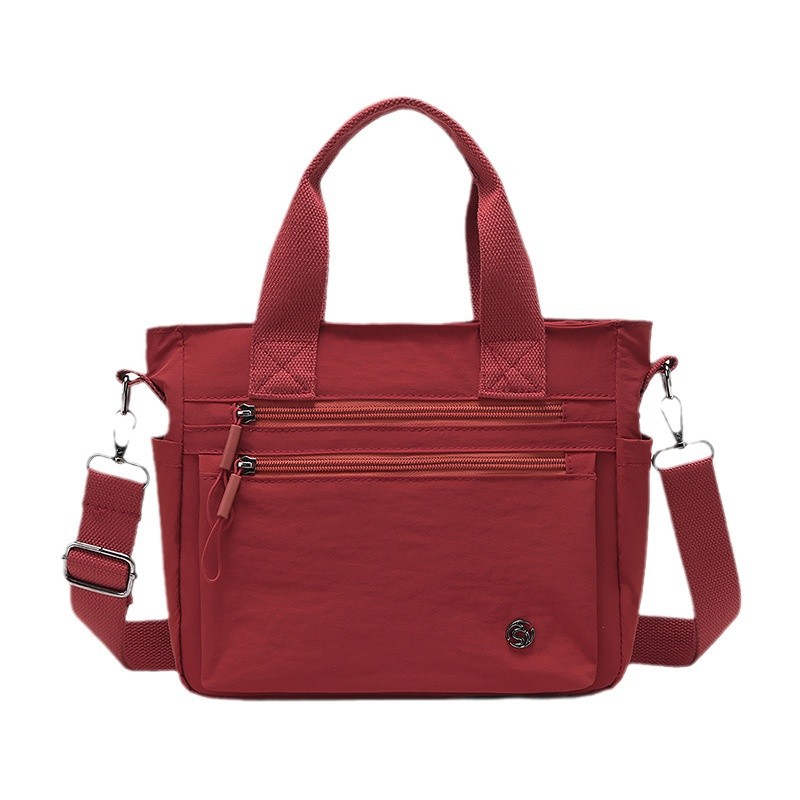 New solid color single-shoulder crossbody handbag, casual and fashionable mommy bag, business commuting multi-functional crossbody bag Item Picture