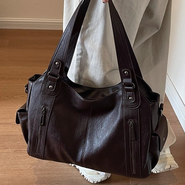 A new 2025 fashionable women's bag with a high-quality texture, large-capacity hand-held tote bag, and a personalized single-shoulder crossbody women's bag for commuting full figure