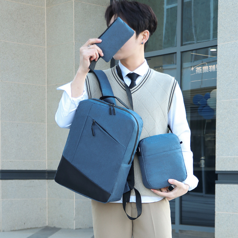 A large-capacity casual men's backpack set of three pieces, a simple business commuting computer backpack, and an Oxford cloth travel crossbody bag full figure