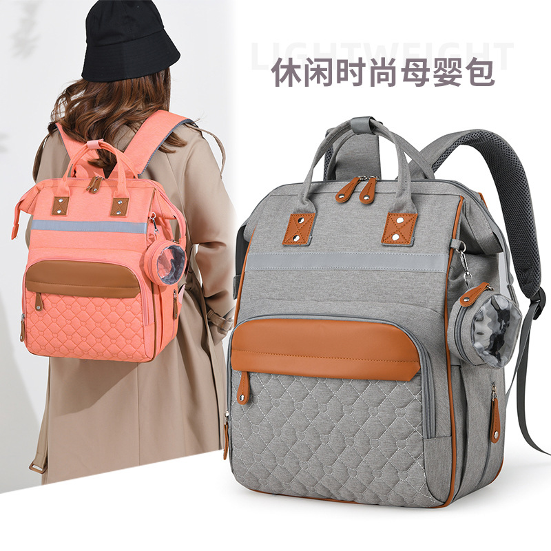 Fashionable backpacks, casual backpacks, large-capacity mommy bags, baby bags that can be hung on strollers when taking kids out full figure