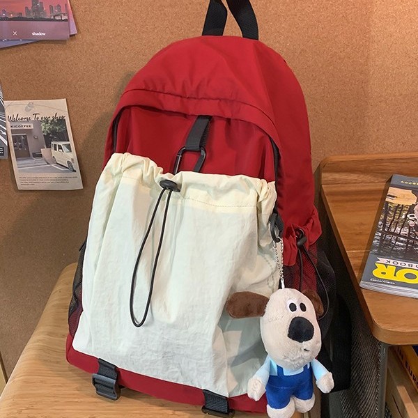 The new autumn and winter color-blocking backpack with a school style and large capacity design is an outdoor sports backpack suitable for both men and women Application Scenario
