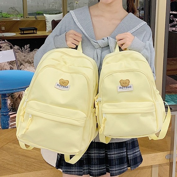 Junior high school student backpack: Korean Instagram cream yellow forest style, versatile, high appearance level girl backpack, high school student backpack full figure