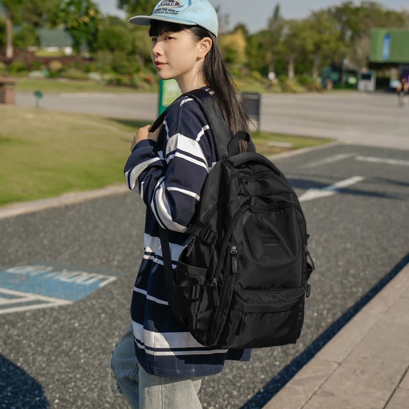 This Japanese-style, Instagram-style, simple campus high school student backpack is a solid-colored girl's Harajuku style versatile backpack details Picture