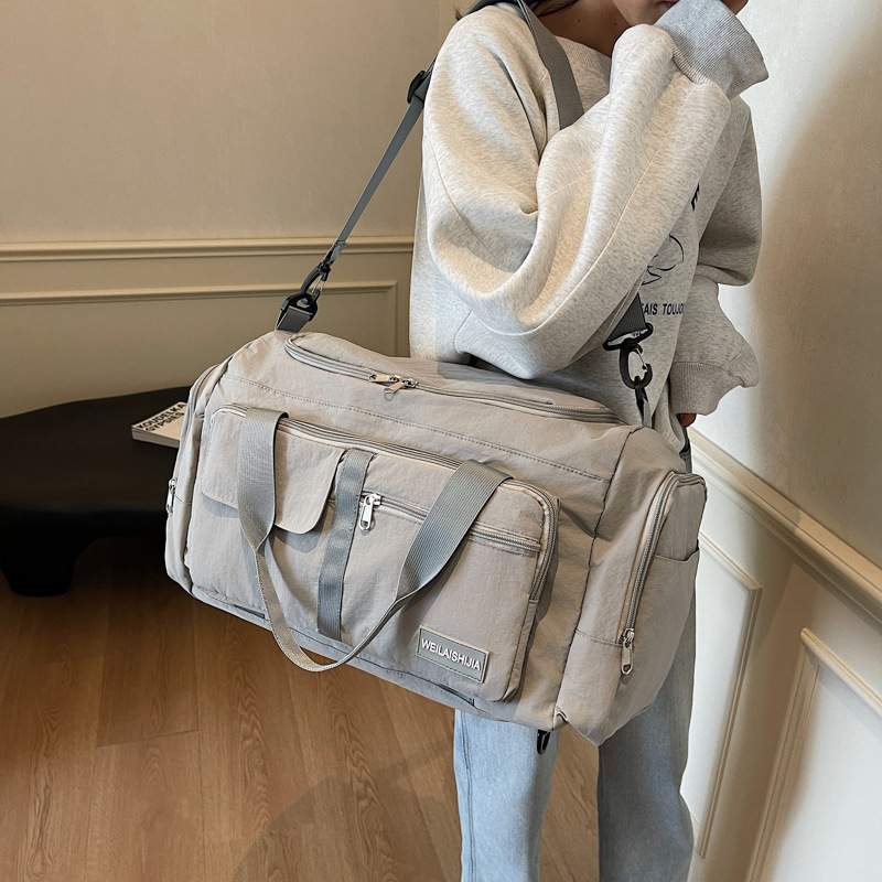 Foldable hand-held travel bag, lightweight and multi-functional double-back sports and fitness bag, dry and wet separation case, trolley luggage bag Specification drawing