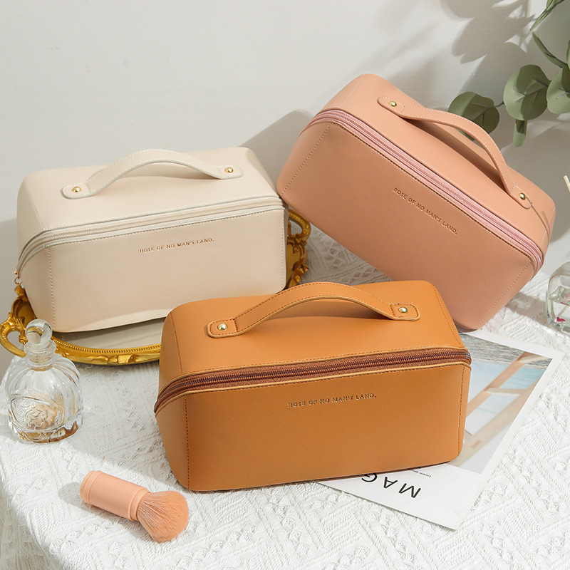 A portable large-capacity pu cosmetics storage bag with a high-end feel for women's travel, a popular pillow and makeup bag details Picture