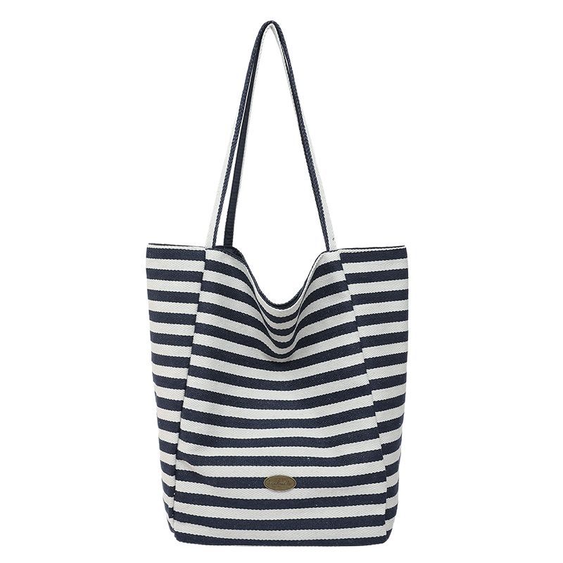 New Spring/Summer 2025 trendy large-capacity bucket bag for women, simple dual-purpose double-sided underarm bag, versatile single-shoulder bag Item Picture