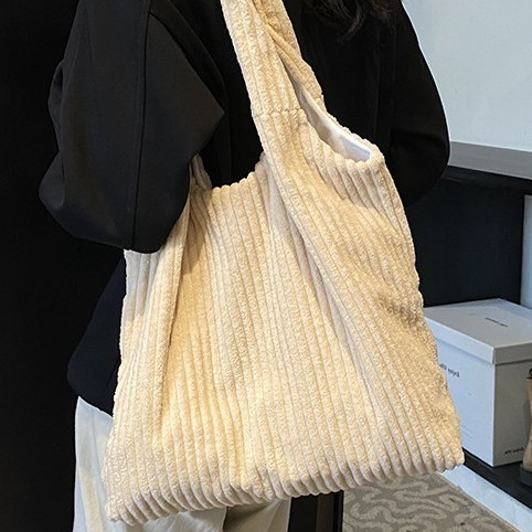 Fashionable corduroy large-capacity bag for women's autumn and winter, new casual commuting single-shoulder bag, simple solid color underarm bag full figure
