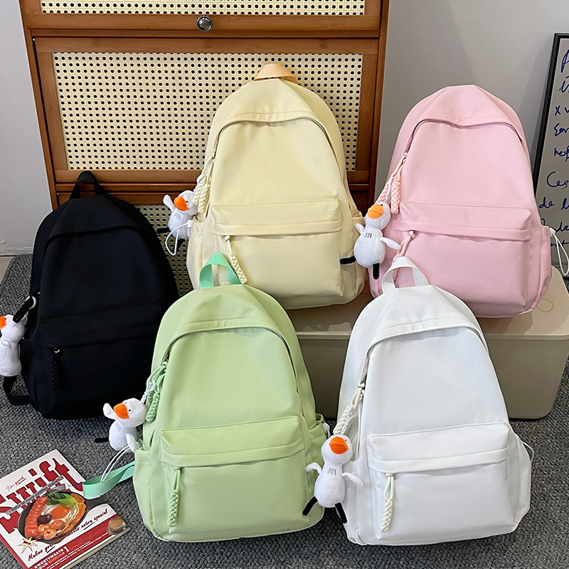 Cross-border schoolbag for girls, high school students, Korean version, simple solid color, junior high school backpack, girls, high school appearance level, travel backpack full figure