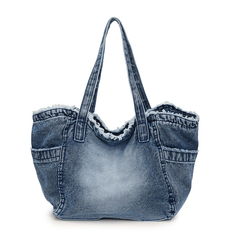 This casual large-capacity handbag is fashionable and versatile. It features a denim fringe fringe fringe fringe design for commuting. It is a laid-back bag that can be carried over one shoulder Item Picture
