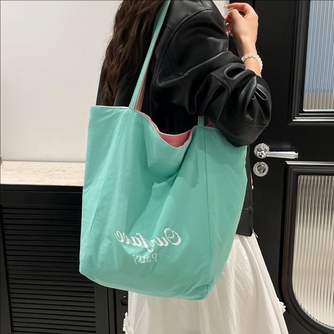 New Spring/Summer 2025 trendy large-capacity bucket bag for women, simple dual-purpose double-sided underarm bag, versatile single-shoulder bag full figure
