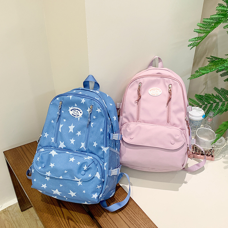 High-appearance-level schoolbags for primary and secondary school students, large-capacity backpacks, outdoor travel backpacks, lightweight, light-reducing and dirt-resistant study bags full figure