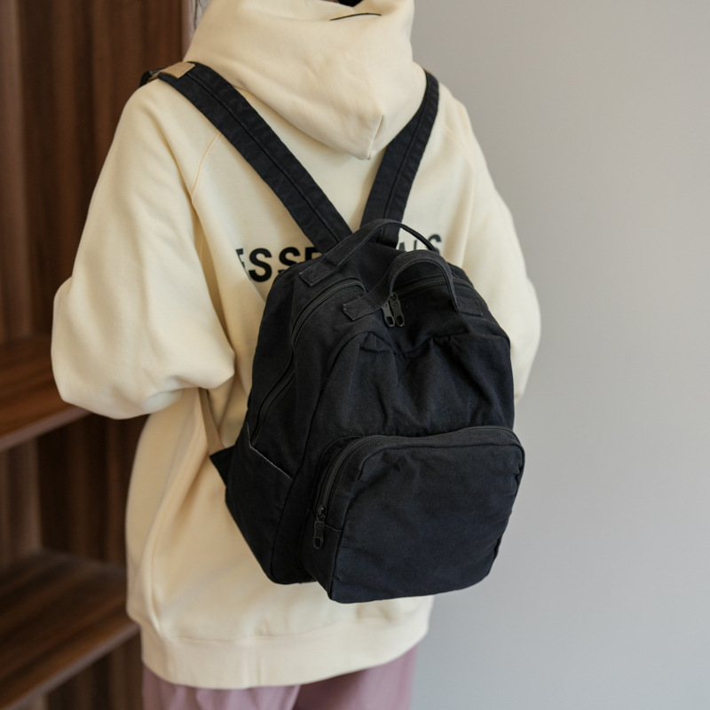 A simple solid-color backpack for Japanese high school and college students, a washable and aged canvas bag, and a retro travel backpack Specification drawing