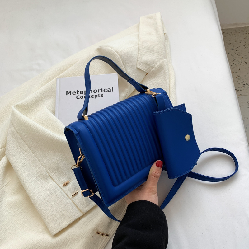 2022 New Summer stylish embossed vertical bar small square bag, simple and casual Korean-style hand-held shoulder crossbody bag full figure
