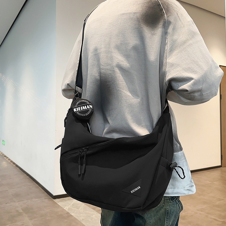 Men's crossbody bag, cool and versatile, 2024 new commuter messenger bag, women's large-capacity lightweight backpack full figure