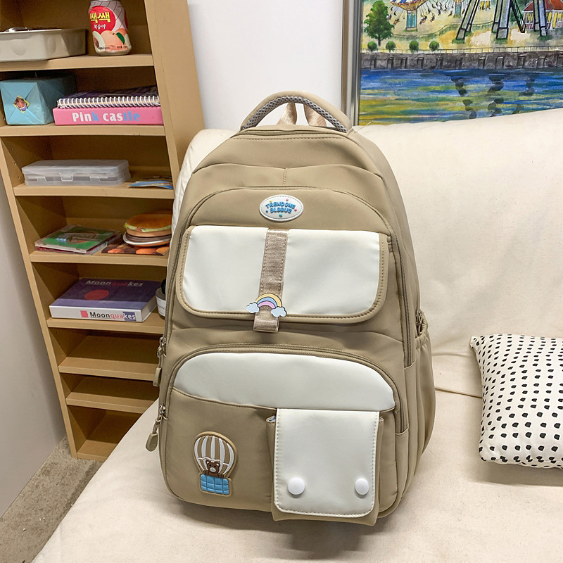 A large-capacity, cute backpack with a contrasting color design for students, a casual and fashionable backpack for junior and senior high school students Specification drawing