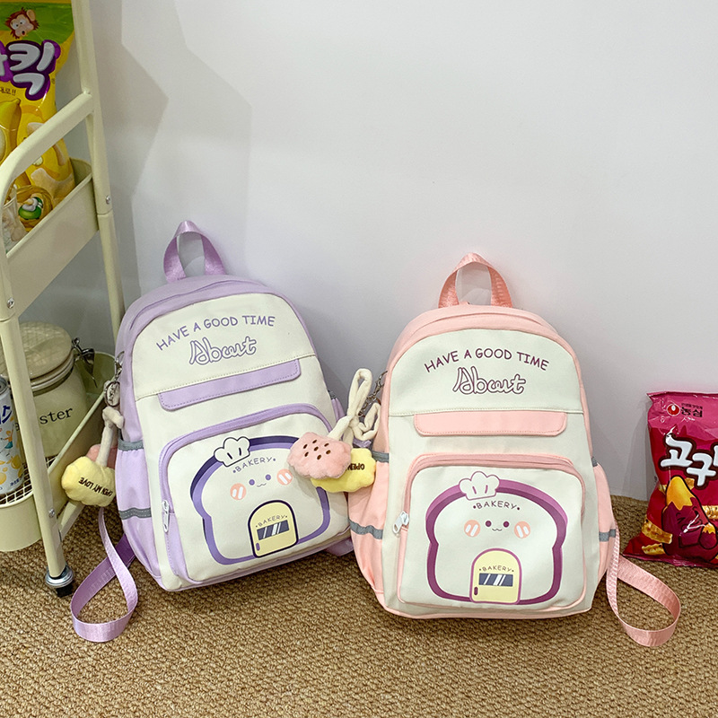 A new high-appearation-level schoolbag for primary school girls, a study bag for girls, a backpack for reducing the burden on girls, and a casual and lightweight children's backpack full figure