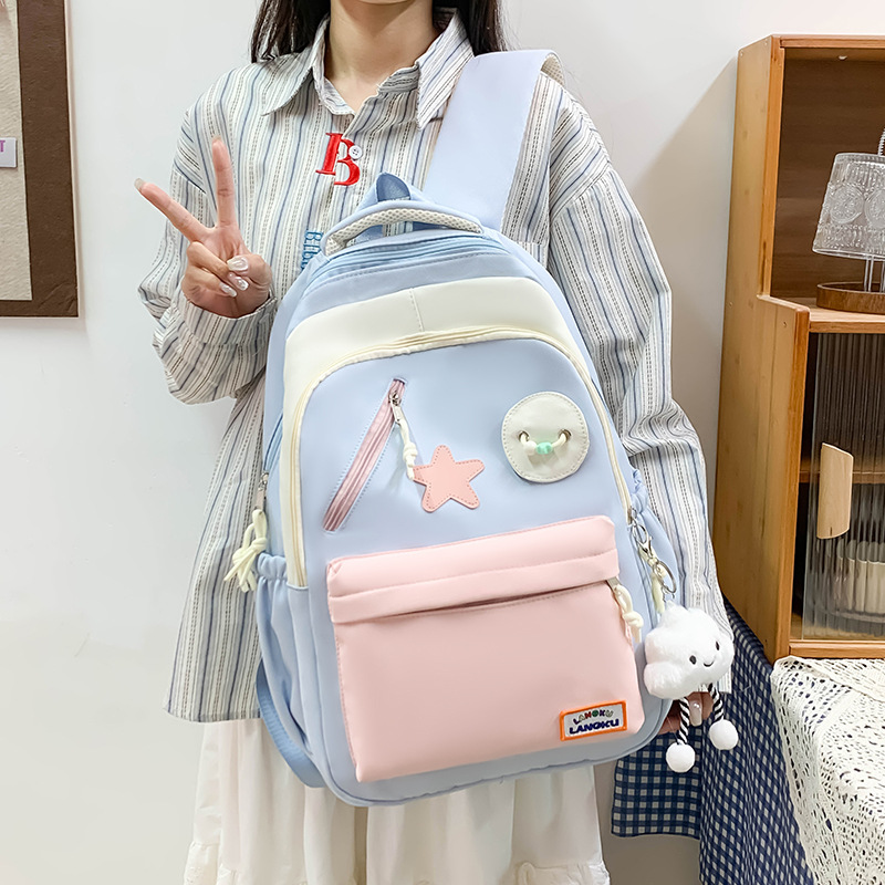 New fashionable schoolbag for middle school students on campus, large-capacity girls' color-blocking backpack for high school students, cute star-shaped versatile bag details Picture