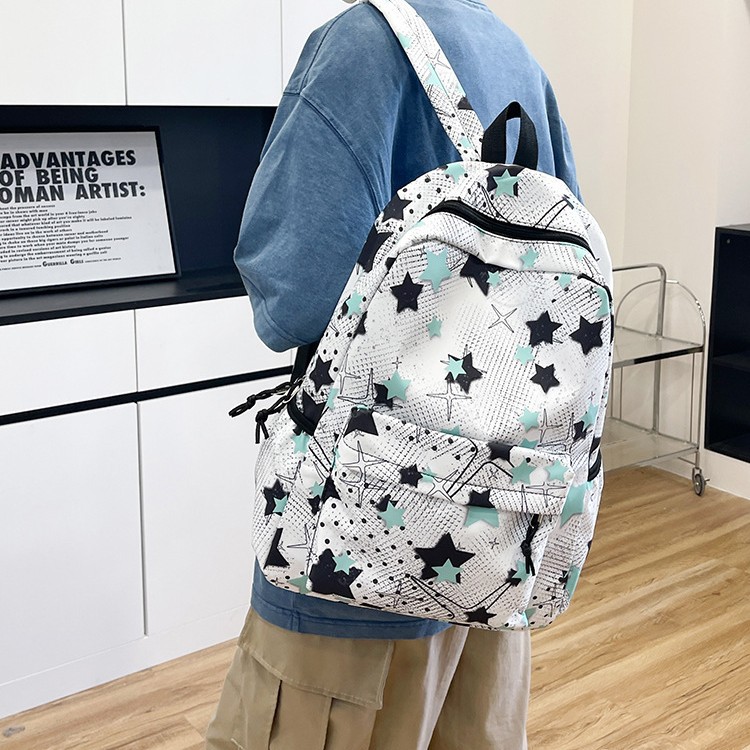 The new schoolbag is cute and fresh. It's a large-capacity backpack for junior and senior high school students with Japanese cartoon graffiti on Instagram Application Scenario
