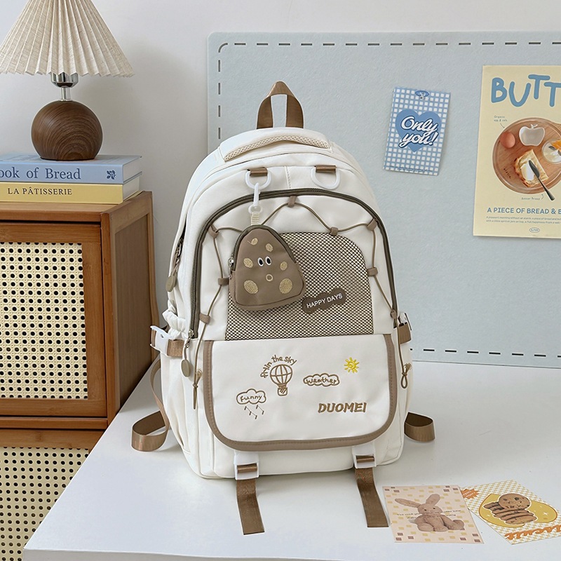 A new, cute, large-capacity, fresh and light Instagram backpack with a contrasting color school style for young girls. Spring outing schoolbag details Picture