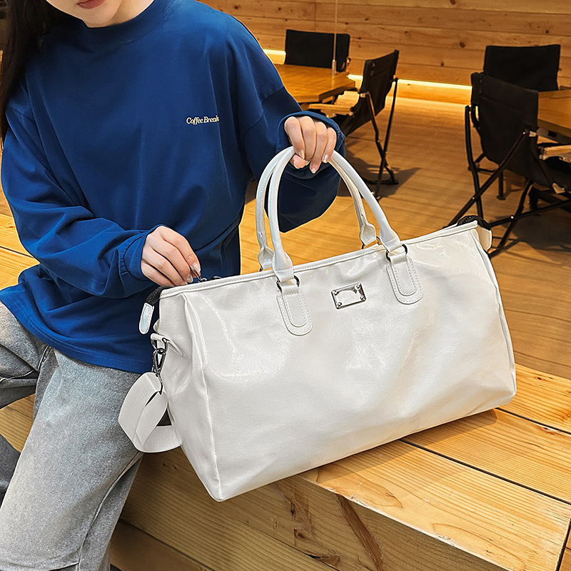 A new large-capacity pu leather sports carry-on bag for both men and women, suitable for business trips and short-distance travel full figure