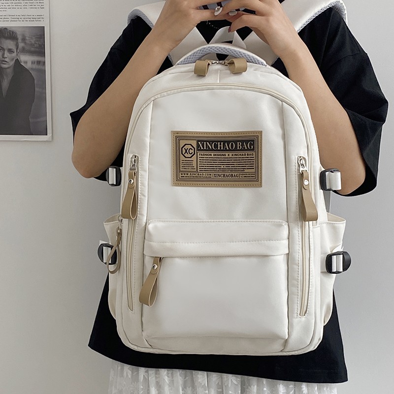 New Japanese-style Harajuku style junior high school casual backpack, high appearance level nylon backpack, simple female college student commuting bag Application Scenario