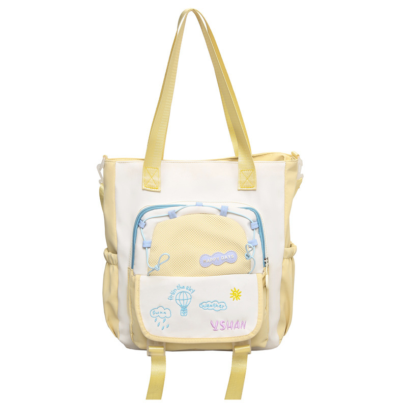 The fresh Korean-style color-blocking tutorial bag for spring and summer is a new style that catches the eye. It has a large capacity single-shoulder handbag and is a student's crossbody bag for class Item Picture