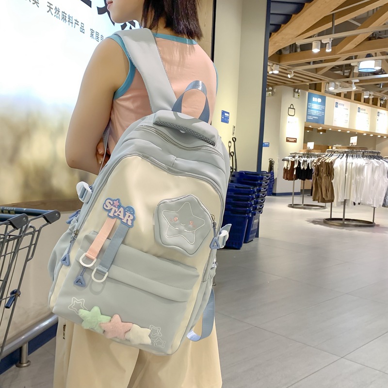 Cute star girl schoolbag, simple and large-capacity junior high school backpack, high appearance level, dirt-resistant campus backpack details Picture