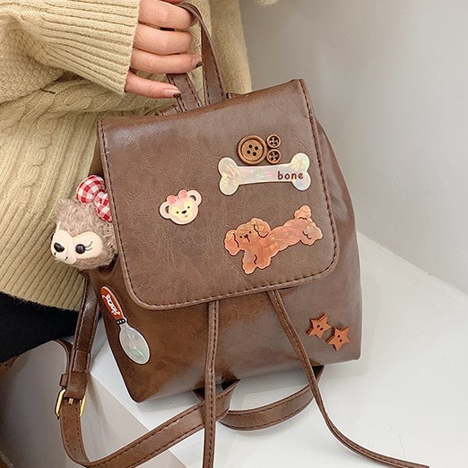 Cute cartoon bone dog backpack, a new retro casual and fashionable backpack for girls' commuting Application Scenario