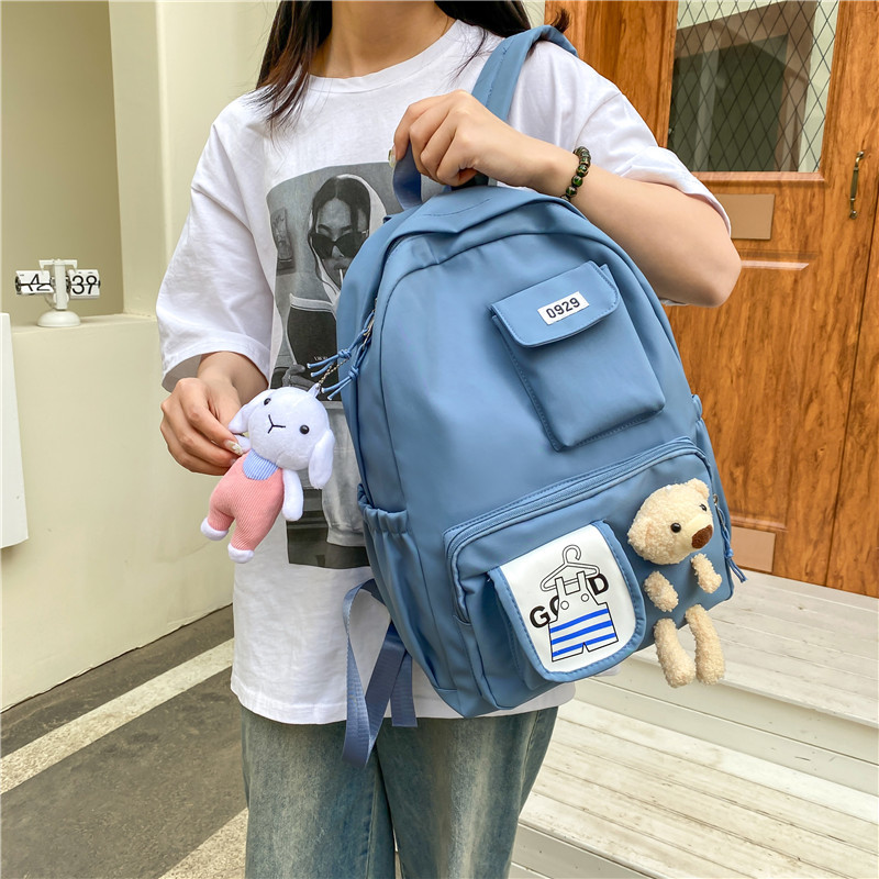 Wholesale of new, fresh and cute bear backpacks for school students, Korean version backpacks for high school and junior high school students full figure