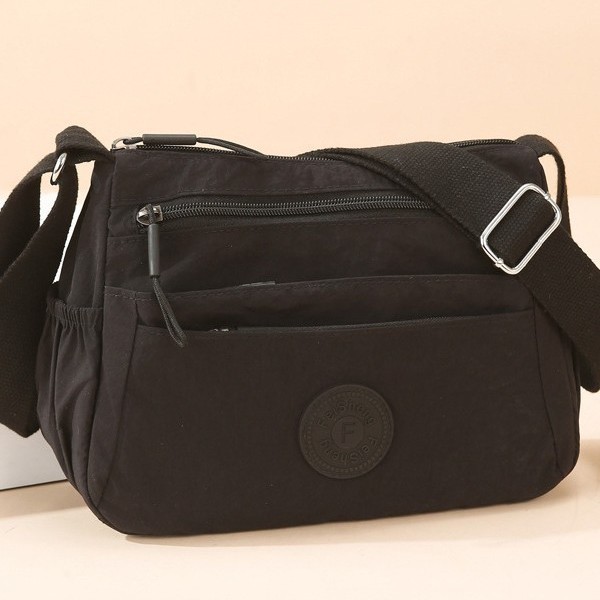 A new multi-layered casual and lightweight single-shoulder crossbody bag for women, a fashionable and simple commuting casual bag for mothers, and a storage bag Specification drawing