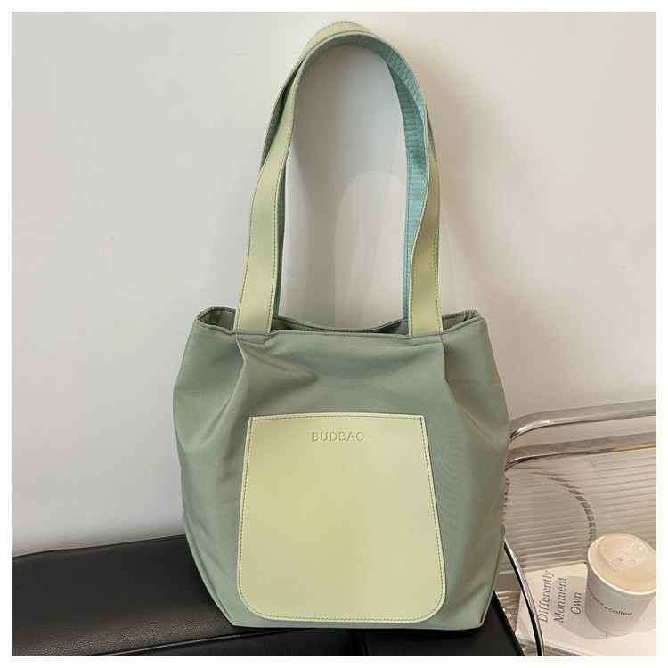 A new 2024 women's casual large-capacity bag, a simple and versatile single-shoulder color-matched tote bag, a lightweight commuting bag details Picture