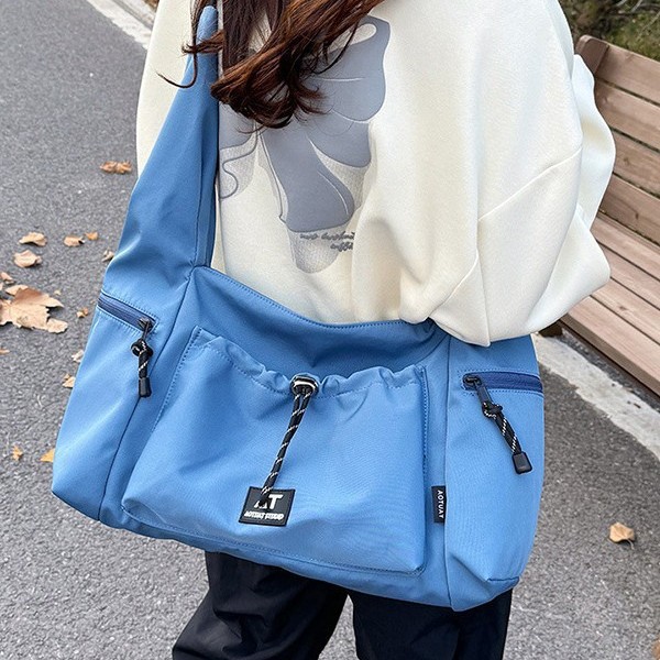 Simple and large-capacity crossbody bag, commuting backpack, men's casual fitness bag, versatile bag, women's college student single-shoulder bag details Picture
