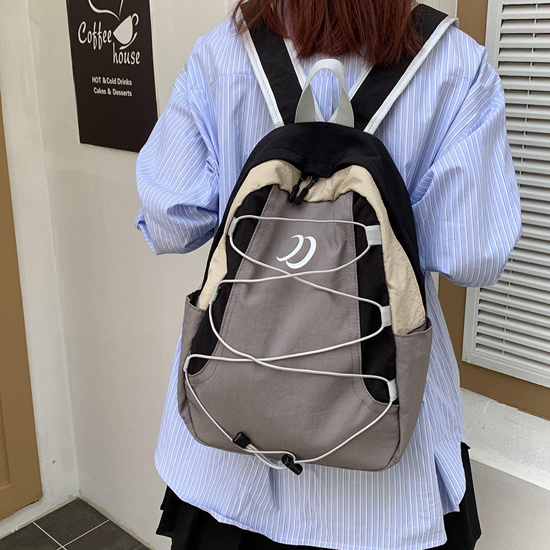 Cross-border solid-color backpacks, outdoor travel backpacks, sports small bags, new lightweight and large-capacity schoolbags Specification drawing
